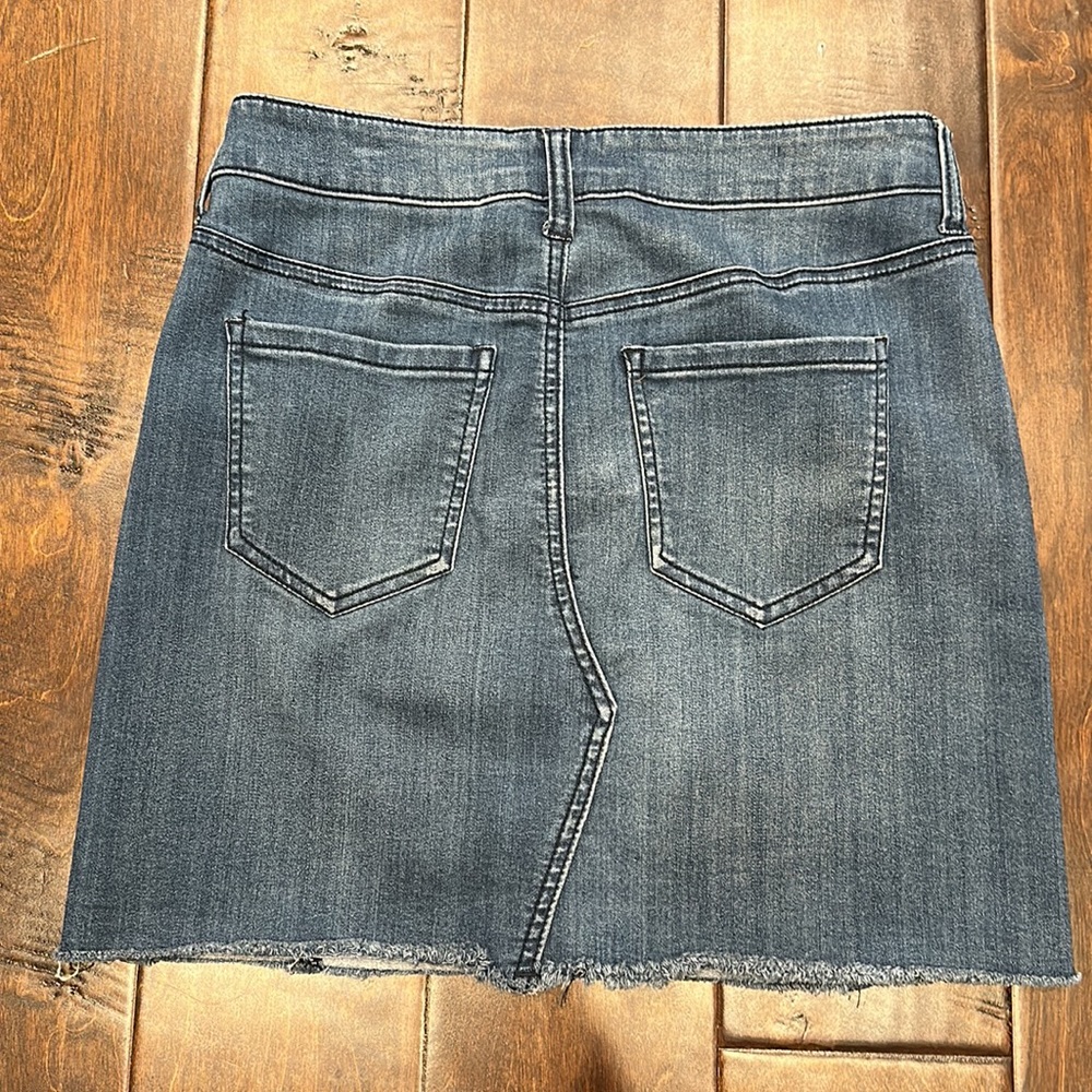 Celebrity and pink denim mini skirt